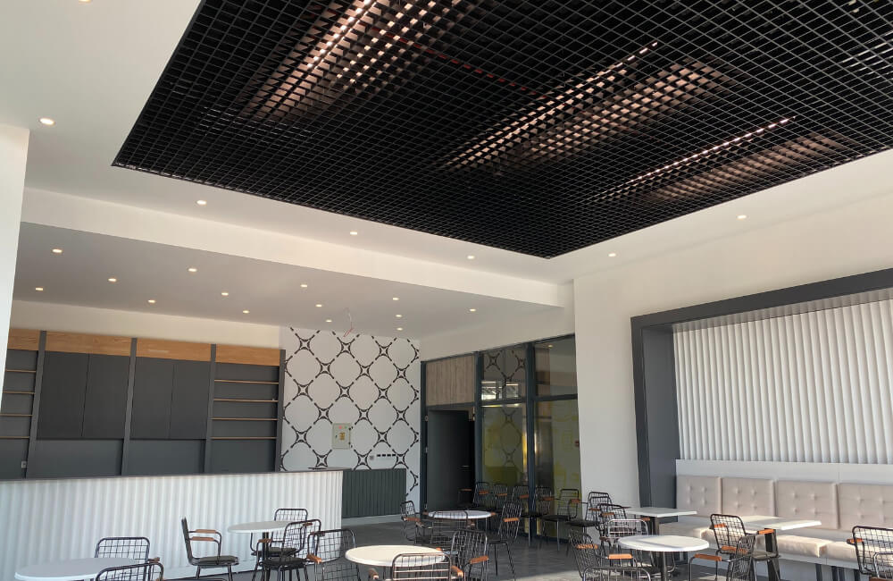 /haber/acik-hucreli-petek-asma-tavanlar--t15-petek-tavan-vs-kendinden-tasiyicili-petek-asma-tavan-sistem-karsilastirmasi